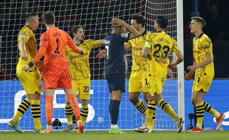 Emre Can coloca como favorito al Real Madrid. "Todo el mundo lo sabe" Kylian Mbappe se lamenta rodeados de jugadores del Dortmund durante el partido de vuelta de semifinales de la UEFA Champions League entre PSG y Dortmund en el Parque de los Príncipes de París. EFE/EPA/YOAN VALAT