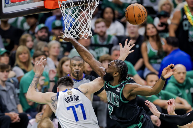 Boston (United States), 10/06/2024.- Boston Celtics guard Jaylen Brown (R) defends a shot attempt by Dallas Mavericks guard Luka Doncic of Slovenia during the second half of the NBA Finals game two in Boston, Massachusetts, USA, 09 June 2024. (Baloncesto, Eslovenia) EFE/EPA/CJ GUNTHER SHUTTERSTOCK OUT
